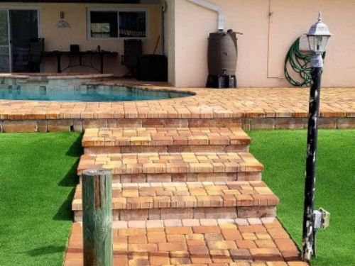 Brick paver on pool deck & stairway