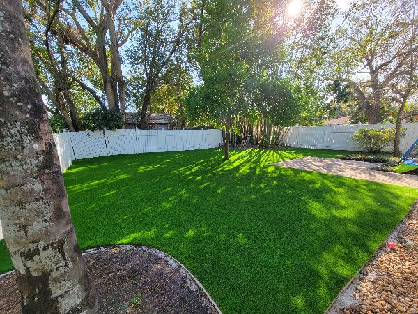 Backyard artificial turf grass lawn