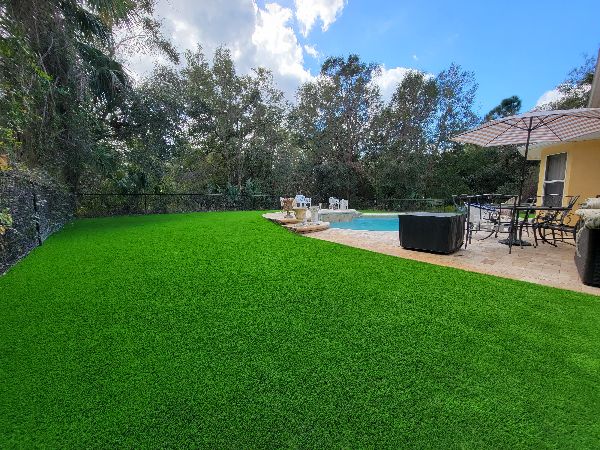 Backyard artificial grass lawn